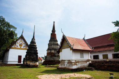 Ancient stupa chedi and ubosot of Wat Phra Si Rattana Mahathat temple for thai people travel visit and respect praying blessing wish holy mystery worship buddha at Suphanburi in Suphan Buri, Thailand