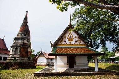 Ancient stupa chedi and ubosot of Wat Phra Si Rattana Mahathat temple for thai people travel visit and respect praying blessing wish holy mystery worship buddha at Suphanburi in Suphan Buri, Thailand