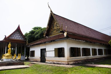 Ancient building ubosot of Wat Phra Si Rattana Mahathat temple for thai people travelers visit and respect praying blessing wish holy mystery worship buddha at Suphanburi city in Suphan Buri, Thailand