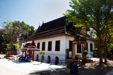 Ancient antique ubosot ordination hall and ruin old chedi stupa for thai people travel visit respect praying blessing wish holy mystery in Wat Choeng Tha pagoda or Koy Tha temple in Ayutthaya Thailand