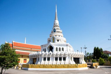 Ancient old chedi stupa and antique ubosot ordination hall for thai people travelers travel visit respect praying blessing wish mystery worship in Wat Toom pagoda or Tum temple in Ayutthaya, Thailand