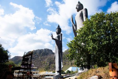 Buddha statue for thai people and foreign travelers travel visit respect praying blessing with holy at Wat Tham Krabok or Thamkrabok temple in Phra Phutthabat on January 12, 2023 in Saraburi, Thailand