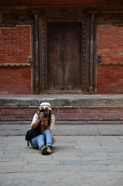 Travelers thai women journey and travel visit ancient nepalese architecture and antique old ruins nepali building royal palace at Basantapur Katmandu Durbar Square Kshetra in Kathmandu valley at Nepal