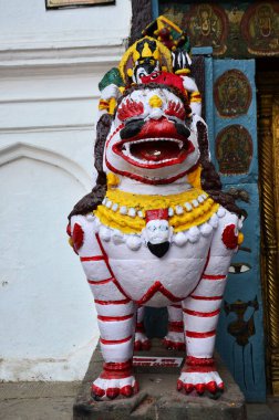 Sculpture carving ancient stone napali lion singha guardian statue at antique old antique Chok Hanuman Dhoka Royal Palace at Basantapur Katmandu for travelers people travel visit in Kathmandu, Nepal