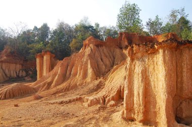 Formation pedestal mushroom rocks from erosion of sandstone of Phae Mueang Phi Forest Park for thai people foreign travelers journey walk travel visit at Phi Pan Nam Range Mountain in Phrae, Thailand