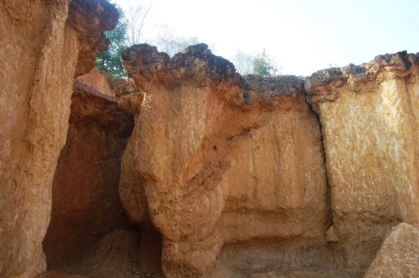 Formation pedestal mushroom rocks of Phae Mueang Phi Forest Park originated from soil landscape and natural erosion of sandstone into various shapes in Phi Pan Nam Range Mountain at Phrae, Thailand