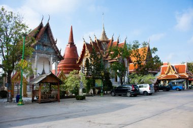 Ancient old ubosot ordination hall and antique stupa ruin chedi for thai people visit respect praying blessing wish holy buddha in Wat Tem Rak Samakkhi Temple on February 5,2023 in Nonthaburi Thailand