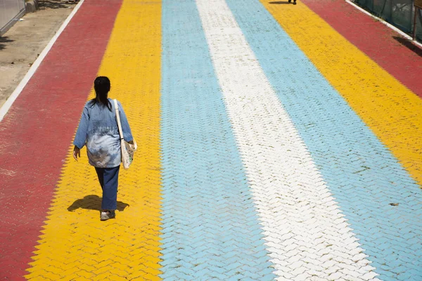 stock image Colorful paving worm brick block pattern for thai people travelers travel visit and walking on multicolor footpath way go to respect praying deity and blessing buddha in Wat Ku at Nonthaburi, Thailand