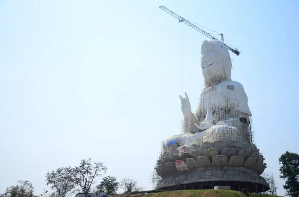 stock image Renovate build big Quan Yin monument and sculpture carved Kuan Yin chinese goddess statue for thai people travelers travel visit in Wat Huay Pla Kang temple at Chiangrai city in Chiang Rai, Thailand