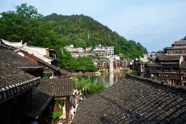 Stock image Landscape tuojiang river and Historic buildings heritage architecture of antique village Xiangxi phoenix fenghuang ancient city for chinese people travelers travel visit on May 9, 2024 in Hunan, China