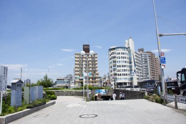 View landscape cityscape modern buildings architecture tower of Fujisawa and traffic road and life lifestyle japanese local people stay living at Kanagawa Enoshima city on July 7, 2024 in Kanto, Japan clipart