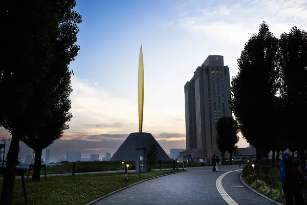 stock image View landscape of Central Square garden with Flame of Liberty Statue in Tokyo Bay and Odaiba waterfront for japanese people travelers travel visit daiba city at Minato on July 4, 2024 in Tokyo, Japan