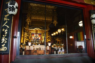 Bodhisattva Kannon or Avalokiteshvara in Sensoji antique temple or Asakusa Kannon ancient pagoda for japanese people traveler travel visit respect praying holy blessing on July 7, 2024 in Tokyo, Japan clipart