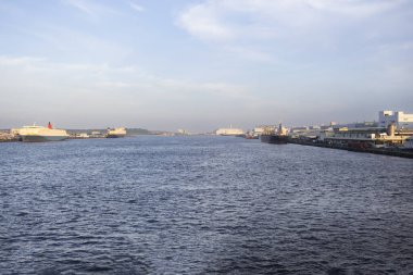 View landscape cityscape of Ariake town and manufacturing industrial port industry harbour in Tokyo Bay and Odaiba waterfront for japanese people work in building office at Minato city in Tokyo, Japan clipart