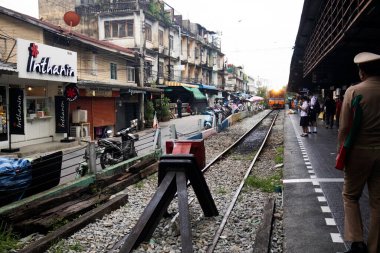 Local bogie locomotive on track railway of Wongwian Yai train station for send receive traveler passenger journey with life lifestyle thai people at Thonburi on September 13, 2024 in Bangkok, Thailand clipart