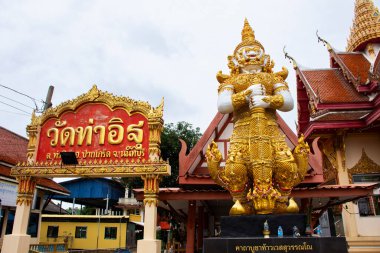 King Thao Wessuwan or Vasavana Kuvera giant statue at Wat Tha It temple for thai people travelers travel visit respect praying blessing mystical wish mystery on July 29, 2024 in Nonthaburi, Thailand clipart