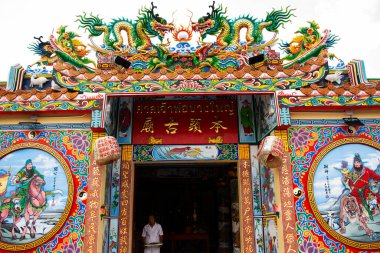 Lao Ben Tou Gong Land god or Bang Yai Chinese God Shrine for thai people travelers travel visit respect praying blessing holy angel deity buddha at Bangyai on October 10, 2024 in Nonthaburi, Thailand clipart