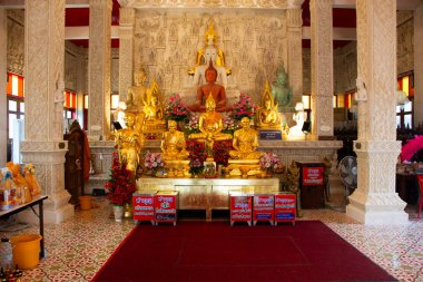 Beautiful holy buddha statue for thai people travelers travel visit respect praying blessing wish myth angel deity in Wat Chulamanee temple at Amphawa on November 17, 2024 in Samut Songkhram, Thailand clipart