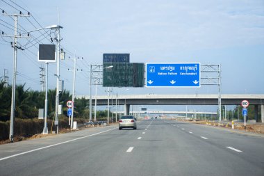 View landscape of highway street and traffic road at intercity motorway routes network m81 bangyai - kanchanaburi and local thai people driving car vehicle on December 26, 2024 at Nonthaburi, Thailand clipart