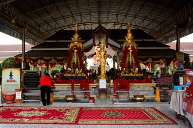 Holy Phra Siam Thewathirat and Thao Wessuwan statue for thai people traveler travel visit and respect pray blessing worship in Wat Bot Temple at Sam Khok on December 29, 2024 in Pathum Thani, Thailand clipart