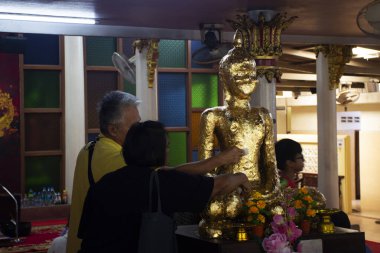 Holy ancient buddha statue Luang Phor Luea for thai people travelers travel visit respect pray blessing antique angel deity in Wat Bot temple at Sam Khok on December 30, 2024 in Pathum Thani, Thailand