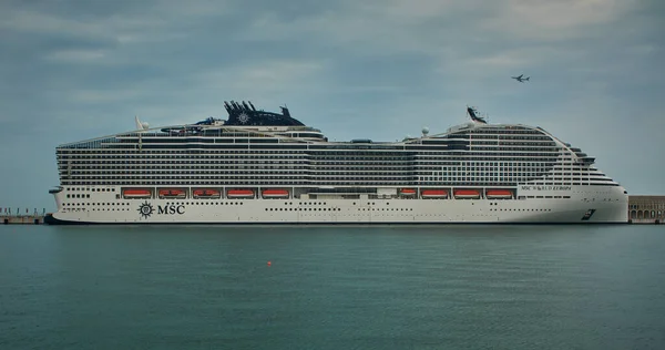 stock image Old Doha port (Mina District) in Doha, Qatar afternoon shot showing  cruise ship ( MSC World Europa) .