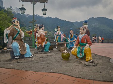 Eight Fairies in The Chin Swee Caves Temple , a Chinese temple situated in most scenic site of Genting Highlands Pahang,  Malaysia clipart