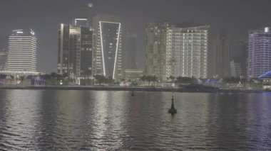 Lusail şehri, Katar-20 Mart 2025: El Maha Adası 'ndan Lusail silueti, kutsal ay ve Ramazan aylarında Lusail Kuleleri ve Vendme Alışveriş Merkezi' ni gösteren gece çekimleri