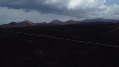 Aerial view of volcanic Lake El Golfo, Lanzarote, Canary Islands, Spain. High quality 4k footage