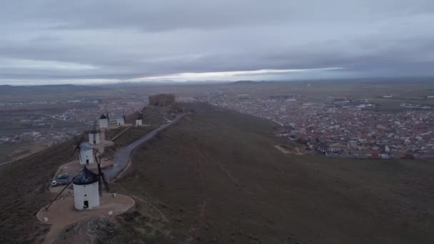 Cinematic Aerial Perspective Windmill Castle Consuegra Drone Dolly Bacward Warm — Stockvideo