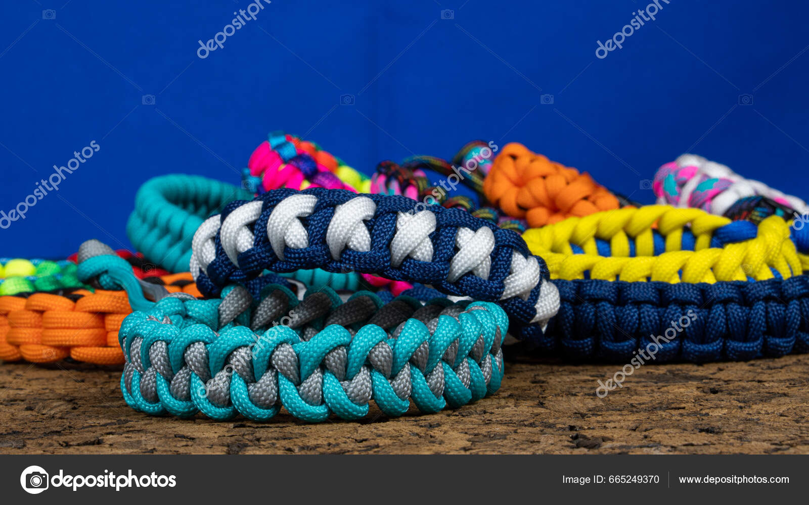 Braided colorful rope friendship bracelets handmade background Stock Photo