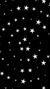 Saf siyah zemin üzerinde dönen beyaz yıldızların hareketli dikey deseni