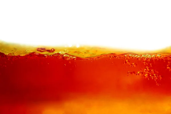 Cola with bubble splash isolated on white background close up