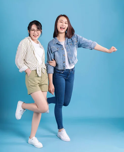 stock image Two women on blue background