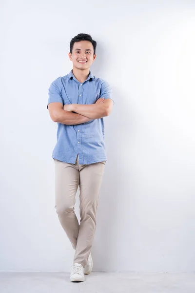 stock image Full length image of young Asian man on white background