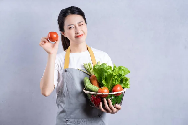 Young Asian Woman Holding Vegetables Background — Stock Photo, Image