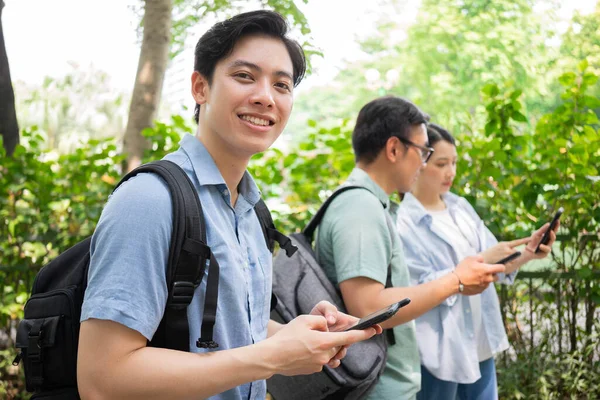 stock image Photo of group Asian student outside