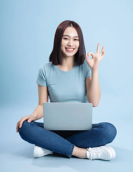 stock image Image of young Asian woman posing on background