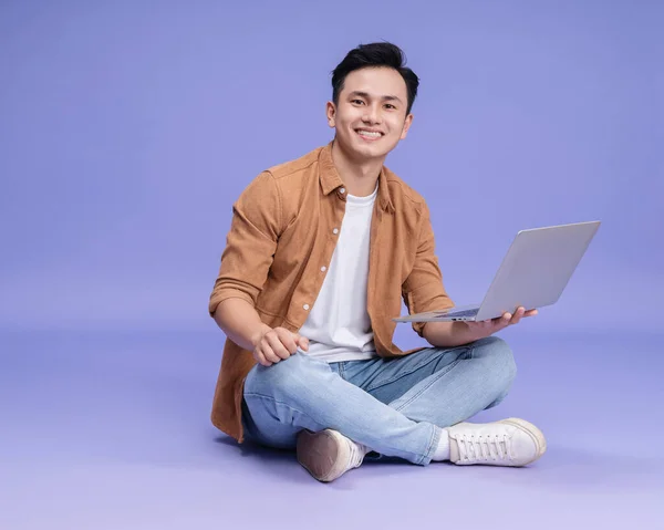 stock image Photo of young Asian man on background