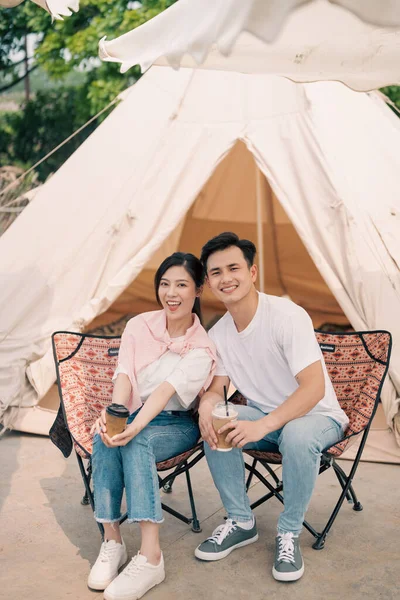 stock image Young Asian couple camping outside