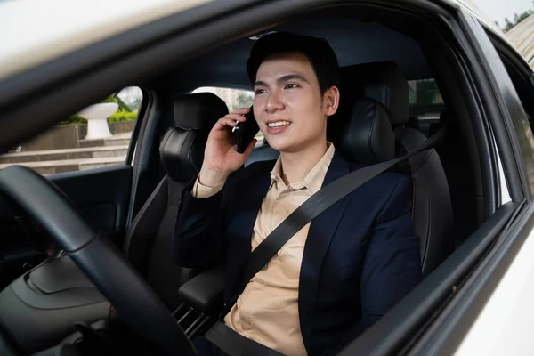 stock image Young Asian business man with car