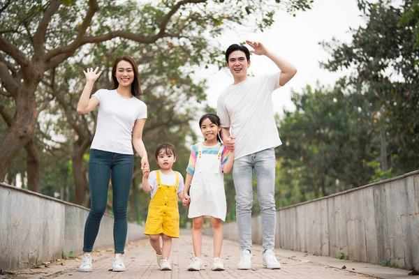 stock image Young Asian family in the park