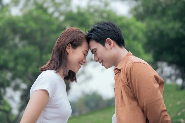 stock image Photo of young Asian couple outside