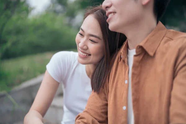 Stock image Photo of young Asian couple outside