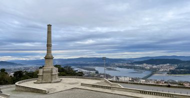 Stone monument in Viana do Castelo, in the bush, overlooking the Limia River