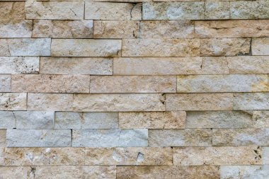 Dekoratif tuğlalarla kaplanmış duvar dokusu