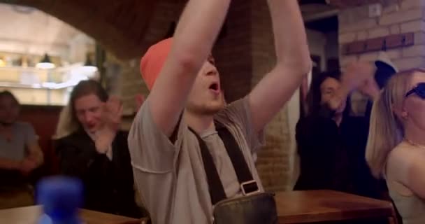Inspired Guy Claps His Hands While Sitting Table Rejoices Good — Vídeo de Stock