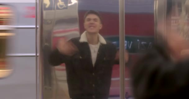 Inspired Guy Sings Rap Subway Moves His Arms Reflection Hallway — Vídeos de Stock