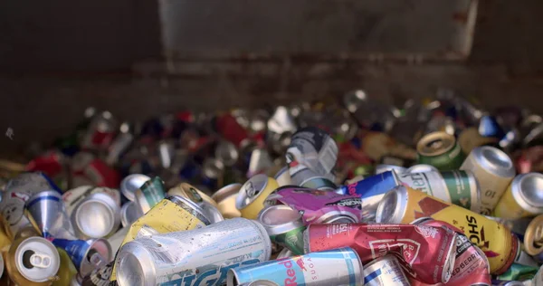 Container collection of metal waste, cans. Sorting garbage at a mobile waste sorting point. Close up. Aluminium drink cans before being transported for recycling. CZ, Milovice, 7.8.22 Let it Roll