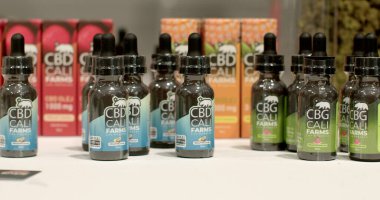 Capturing the attention of a CBG buyer CBD oil bottles closeup. Organic oils are made from 100 percent organic hemp and are vegan, gluten and GMO free. 6.11.2022 Letnany, Prague, CZ 